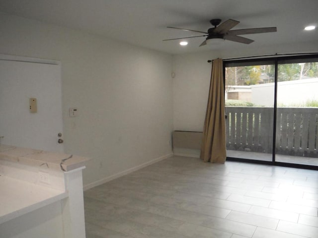 empty room featuring ceiling fan