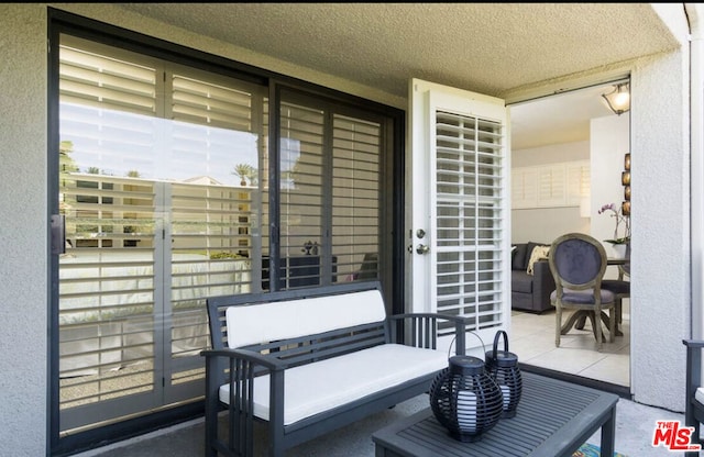 view of patio / terrace with a balcony