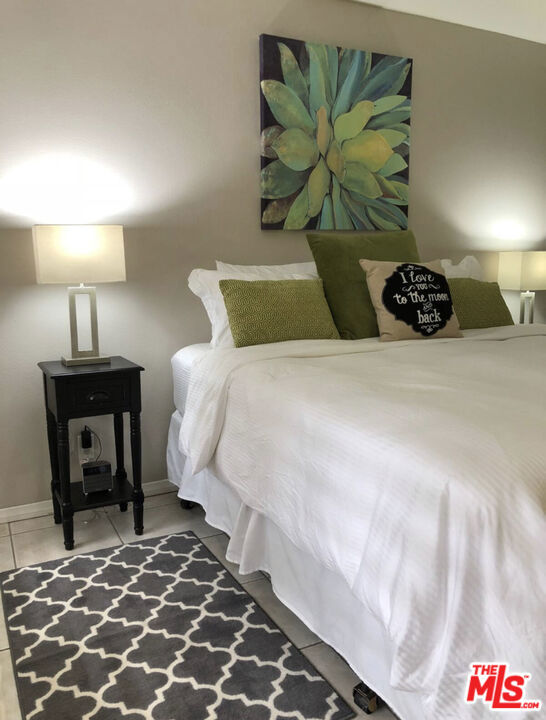 bedroom with tile patterned flooring