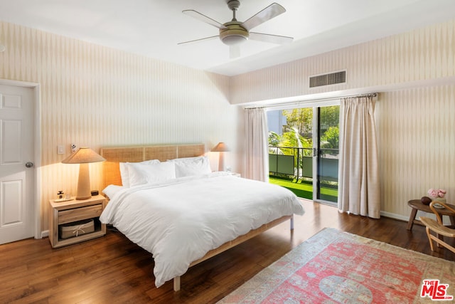 bedroom with ceiling fan, access to exterior, and dark hardwood / wood-style flooring