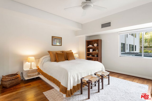 bedroom featuring ceiling fan and wood-type flooring