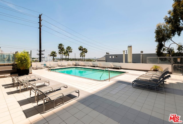 view of pool with a patio