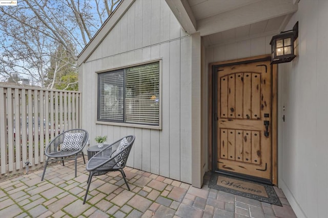 entrance to property featuring a patio