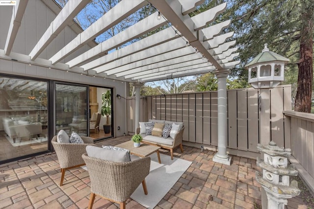 view of patio / terrace with an outdoor hangout area and a pergola