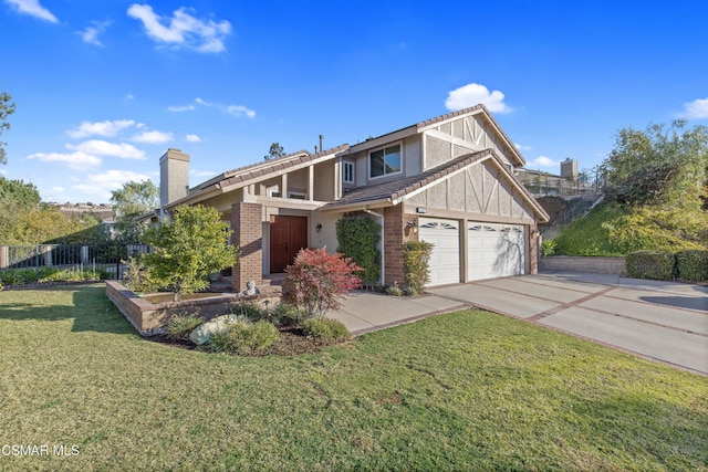 view of front facade featuring a garage and a front lawn