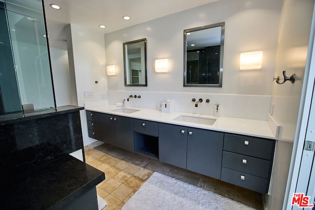 bathroom featuring vanity and tile patterned floors