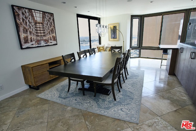 dining room featuring a wall of windows