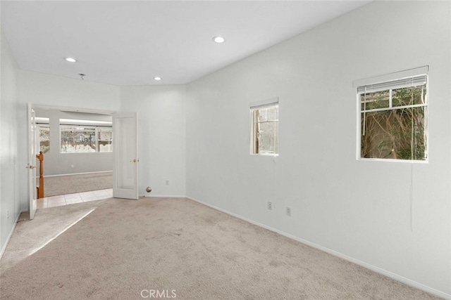 unfurnished bedroom with carpet floors, baseboards, and recessed lighting