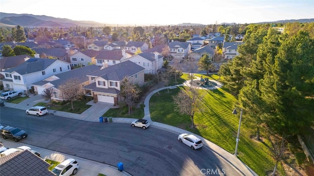 birds eye view of property with a residential view