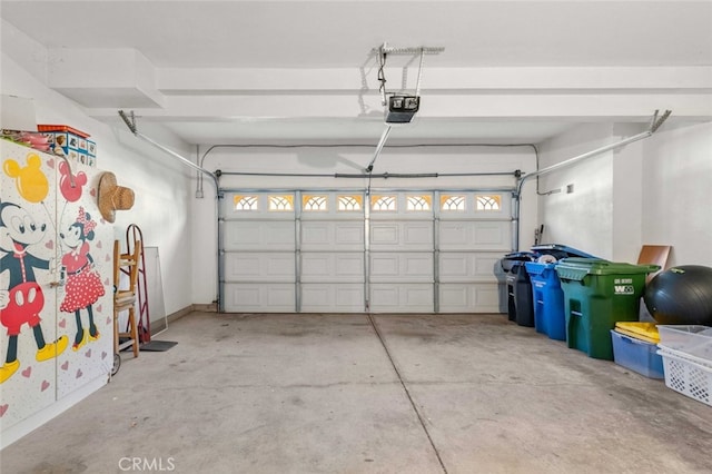 garage featuring a garage door opener