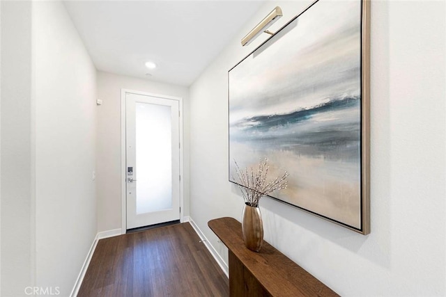 doorway featuring dark hardwood / wood-style floors