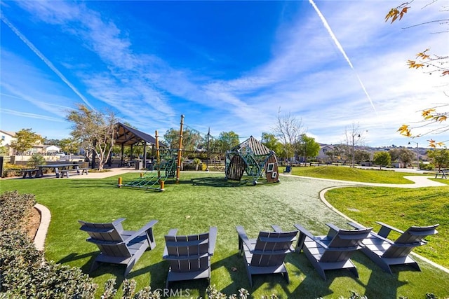 view of property's community with a gazebo and a lawn