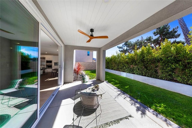 view of patio / terrace with ceiling fan