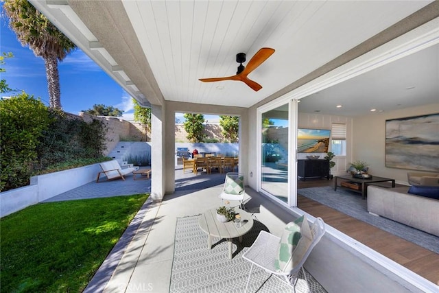 view of patio / terrace with outdoor lounge area and ceiling fan