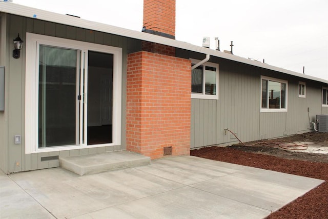 exterior space featuring a patio and central air condition unit