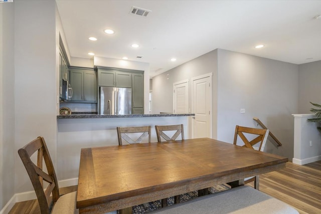 dining room featuring hardwood / wood-style flooring