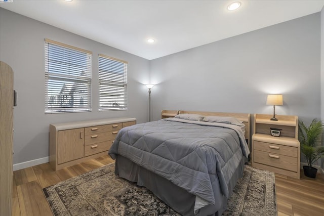 bedroom featuring wood-type flooring