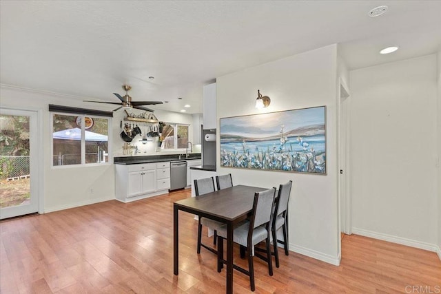 dining area with recessed lighting, a ceiling fan, light wood-type flooring, and baseboards