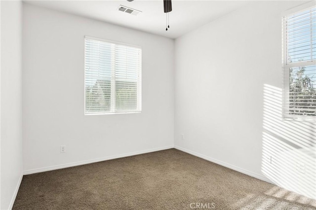 30272 Tattersail Way, Menifee, CA 92584 - spare room featuring carpet floors, healthy amount of natural light, ceiling fan, and baseboards