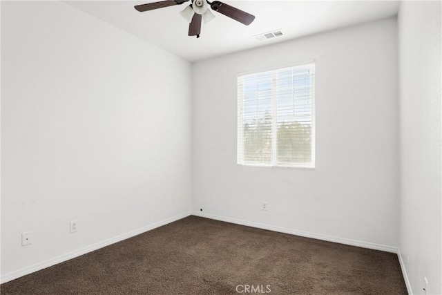 30272 Tattersail Way, Menifee, CA 92584 - unfurnished room with dark colored carpet, a ceiling fan, and baseboards