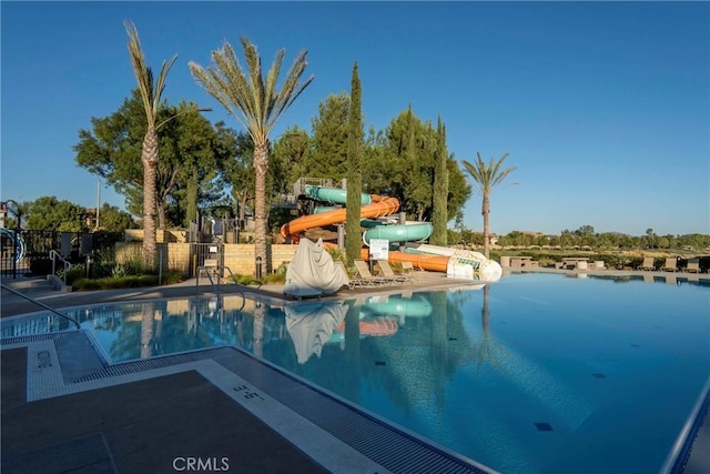 30272 Tattersail Way, Menifee, CA 92584 - community pool with a water slide and fence