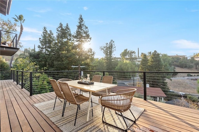 deck with outdoor dining space