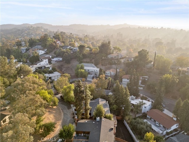 drone / aerial view with a mountain view and a residential view