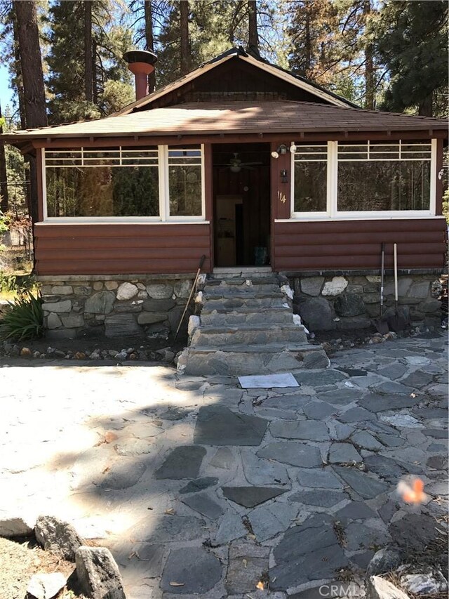 view of front of home featuring a patio