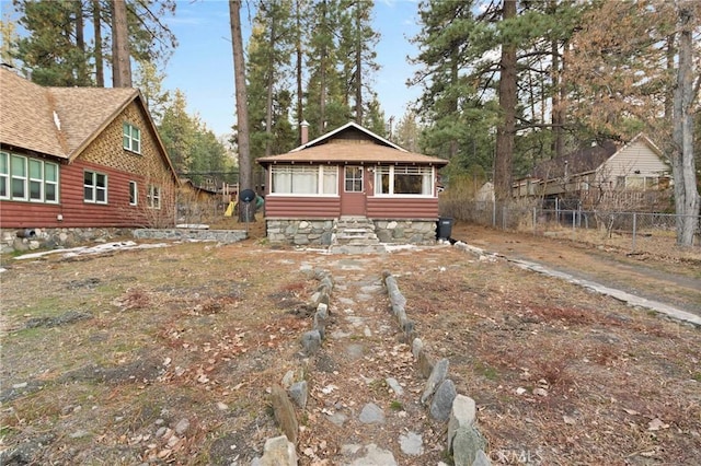 1149 Apple Ave, Wrightwood, CA 92397 - rear view of house with driveway and fence