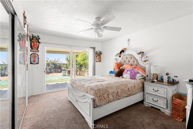 carpeted bedroom featuring ceiling fan, access to exterior, and a textured ceiling