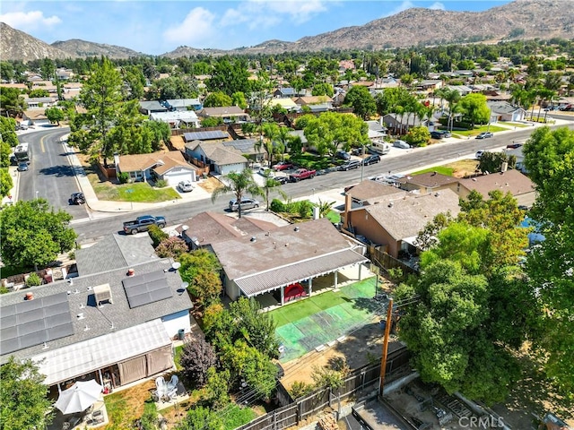 drone / aerial view featuring a mountain view