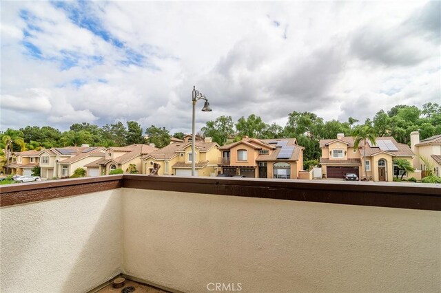 balcony featuring a residential view