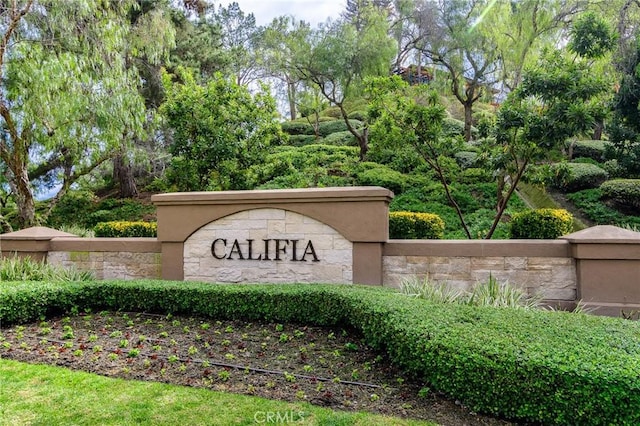 view of community sign