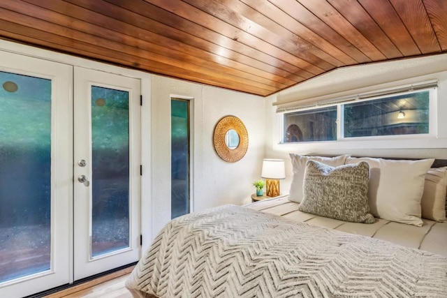 bedroom with vaulted ceiling, french doors, access to exterior, wood ceiling, and light hardwood / wood-style flooring