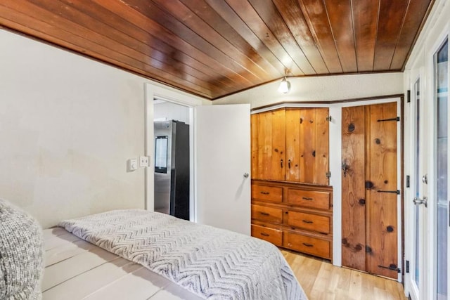 bedroom featuring light wood-type flooring and wood ceiling