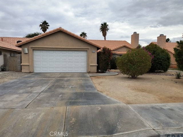 ranch-style home with a garage