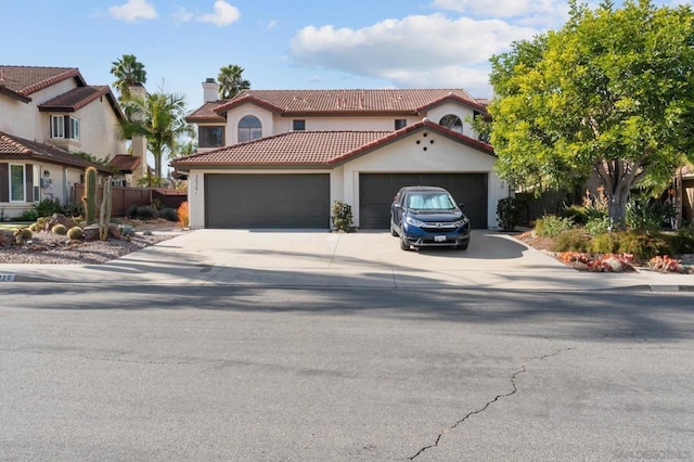 mediterranean / spanish-style house featuring a garage