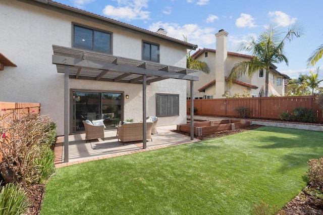 rear view of property with an outdoor living space, a pergola, a patio area, and a lawn