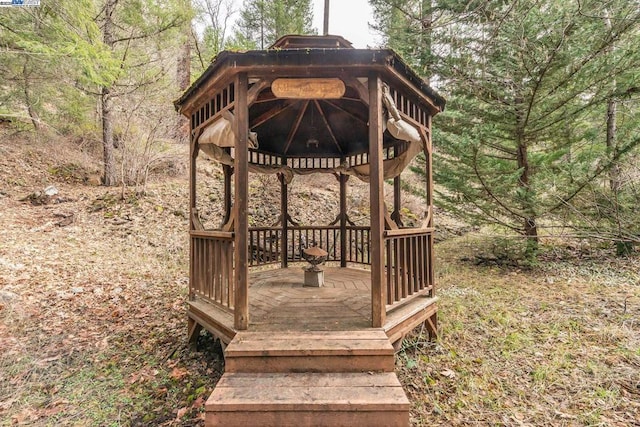 wooden deck featuring a gazebo