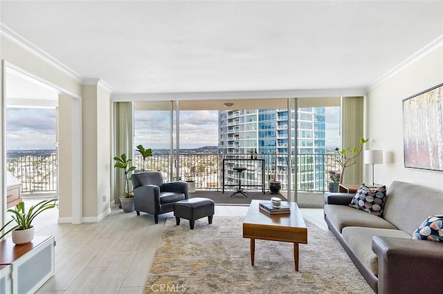 living room featuring ornamental molding, hardwood / wood-style floors, and a wall of windows