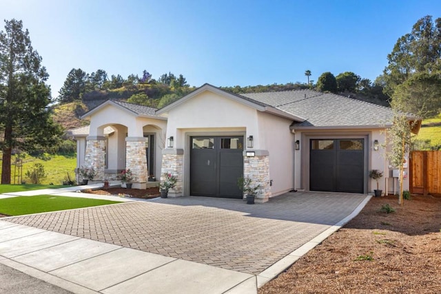 view of front of home with a garage