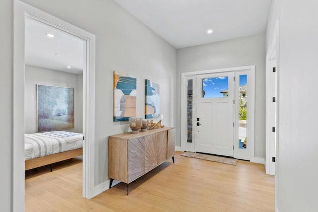 entryway with light wood-type flooring