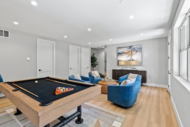 game room with billiards and light wood-type flooring