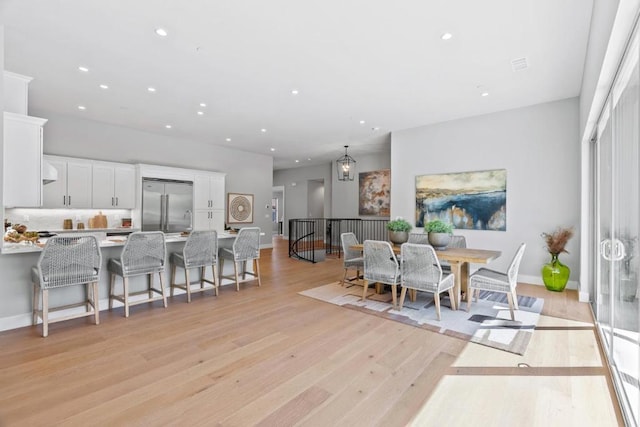 dining room featuring light wood-type flooring