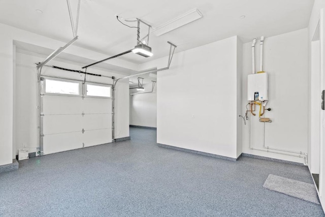 garage featuring a garage door opener and water heater