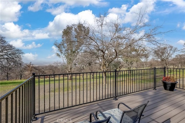 deck featuring a lawn