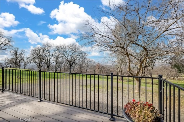 deck featuring a yard