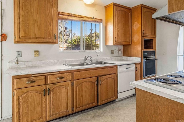 kitchen with sink, black oven, white dishwasher, ventilation hood, and cooktop