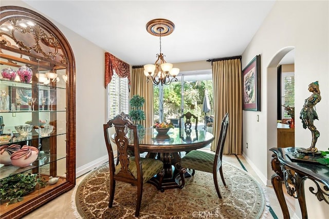 dining room with a chandelier