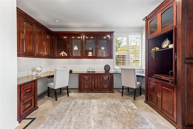 office featuring recessed lighting, built in desk, and light tile patterned flooring